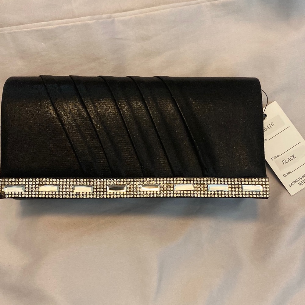 Small black cloth with silver rhinestones